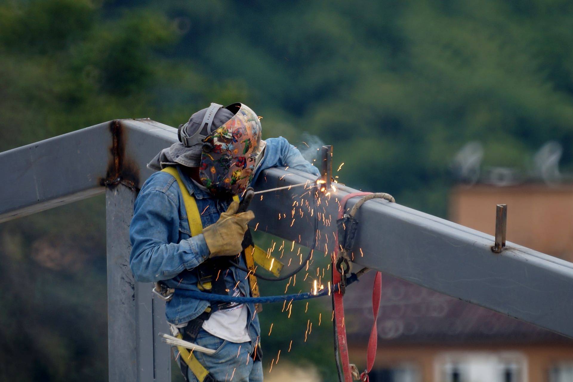 Welder working on structural steel
