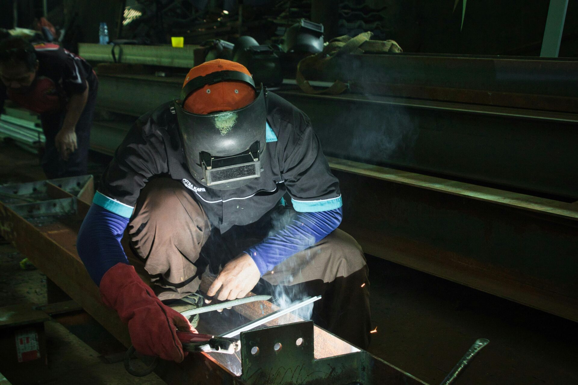 Welder fabricating structural steel in Sydney, Grana Works